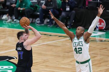 BOSTON, MASSACHUSETTS - JUNE 06: Luka Doncic #77 of the Dallas Mavericks shoots the ball against Al Horford #42 of the Boston Celtics during the third quarter in Game One of the 2024 NBA Finals at TD Garden on June 06, 2024 in Boston, Massachusetts. NOTE TO USER: User expressly acknowledges and agrees that, by downloading and or using this photograph, User is consenting to the terms and conditions of the Getty Images License Agreement.   Adam Glanzman/Getty Images/AFP (Photo by Adam Glanzman / GETTY IMAGES NORTH AMERICA / Getty Images via AFP)