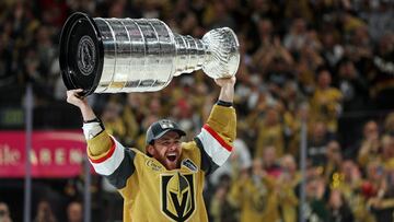 Reilly Smith #19 of the Vegas Golden Knights hoists the Stanley Cup after a win against the Florida Panthers